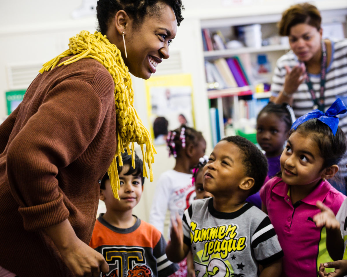 Teaching artist with interested children